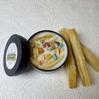 Sage green soy wax candles in crystal clear glass jars with dried botanicals, 12+ hour burn time - House of Avana