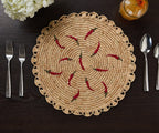 Scattered Chili Handwoven Raffia Round Placemat – Artisan Table Décor Payton James