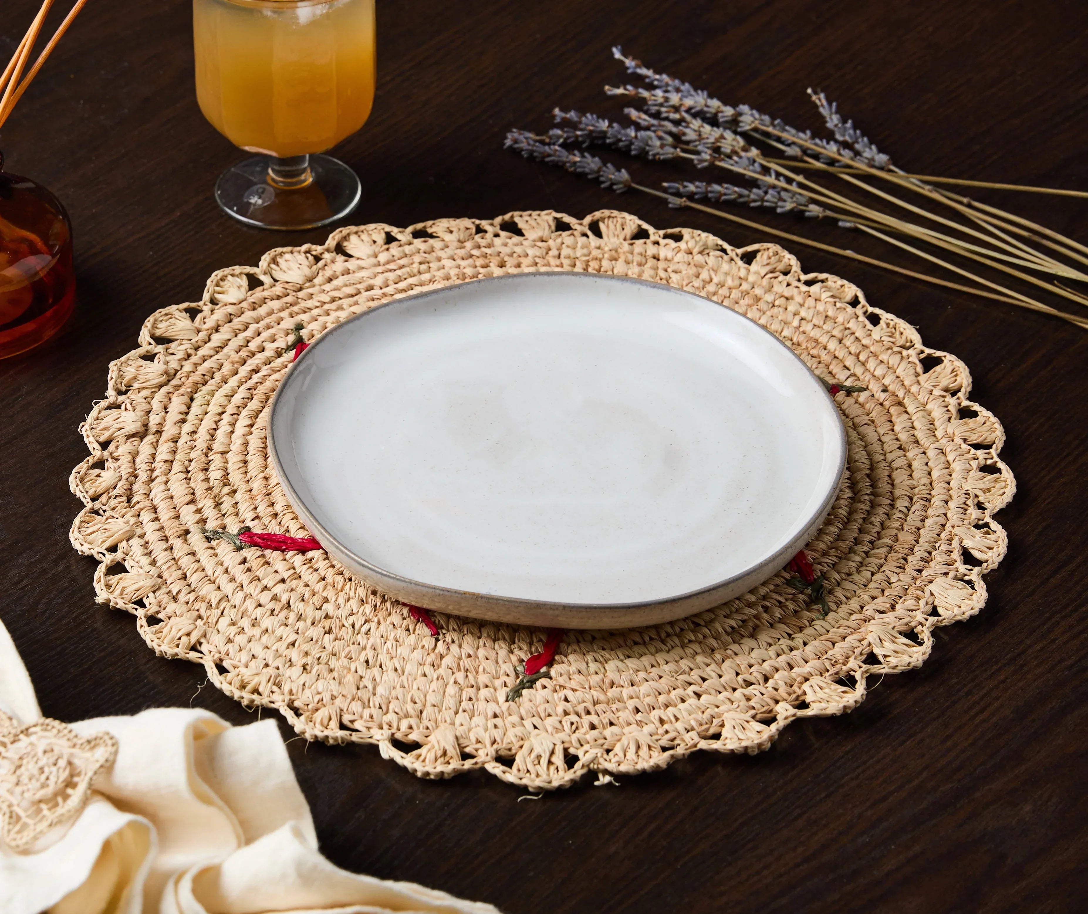 Scattered Chili Handwoven Raffia Round Placemat – Artisan Table Décor Payton James