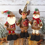Set of 3 Christmas Decorations Featuring Plush Figurines with Extendable Spring Legs, Including a Snowman, Reindeer, And Santa Claus. These Adjustable Leg Ornaments Are Perfect for Holiday Parties And Make Great Gifts. House Of Avana