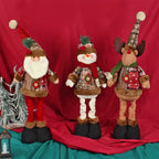 Set of 3 Christmas Decorations Featuring Plush Figurines with Extendable Spring Legs, Including a Snowman, Reindeer, And Santa Claus. These Adjustable Leg Ornaments Are Perfect for Holiday Parties And Make Great Gifts. House Of Avana