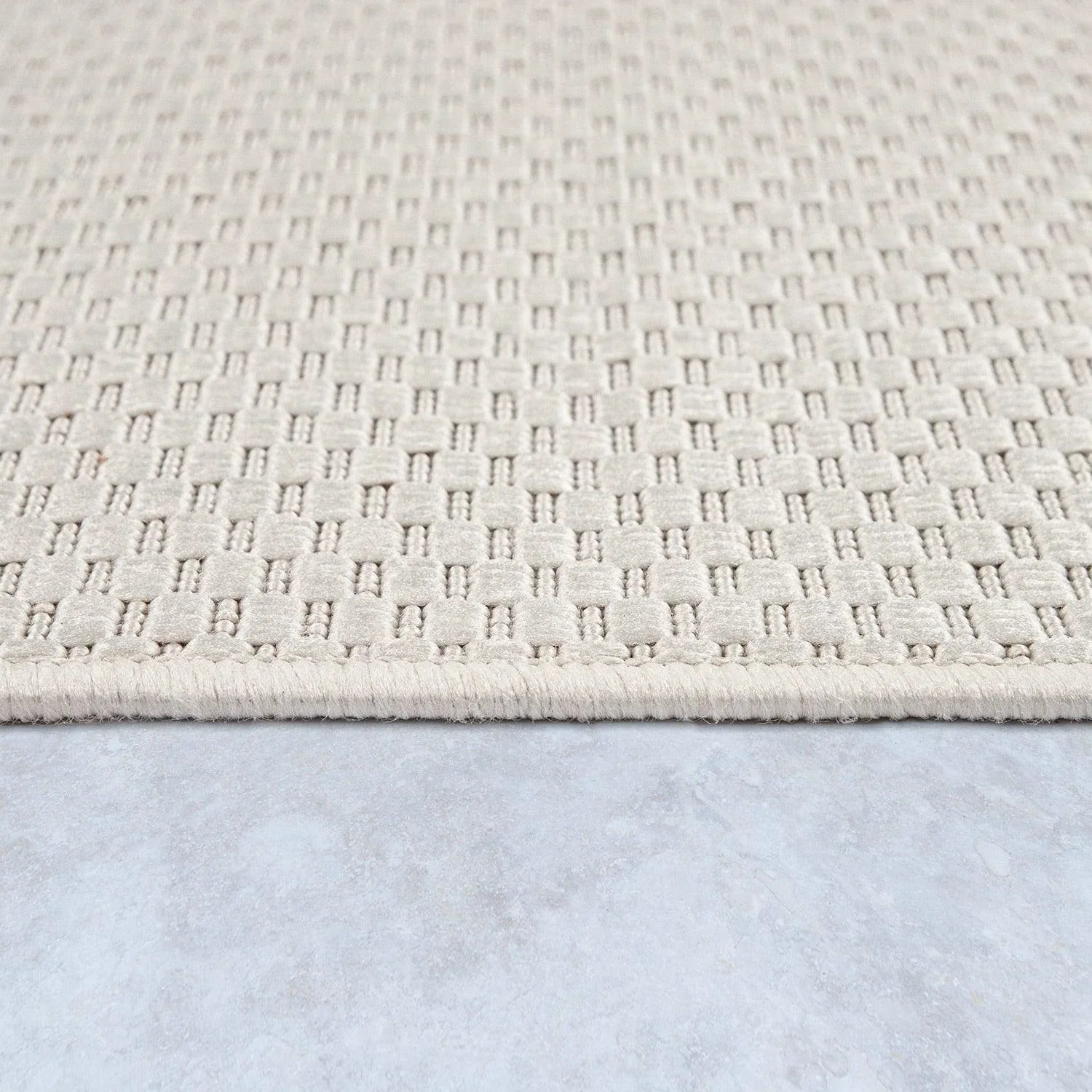 Solid Outdoor Rug for Patio or Balcony Weatherproof in Mottled Cream, back view - House Of Avana