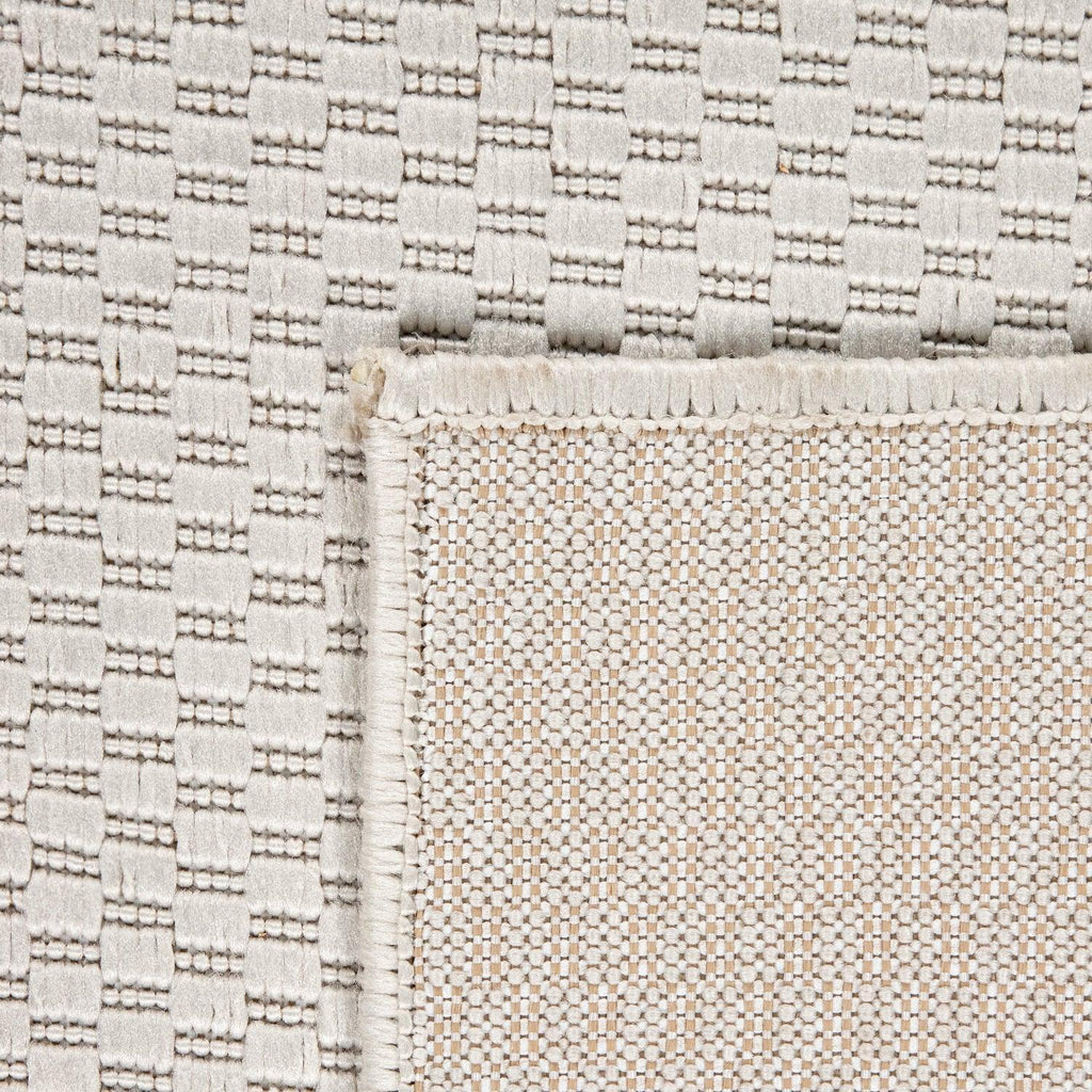 Solid Outdoor Rug for Patio or Balcony Weatherproof in Mottled Cream, side view - House Of Avana