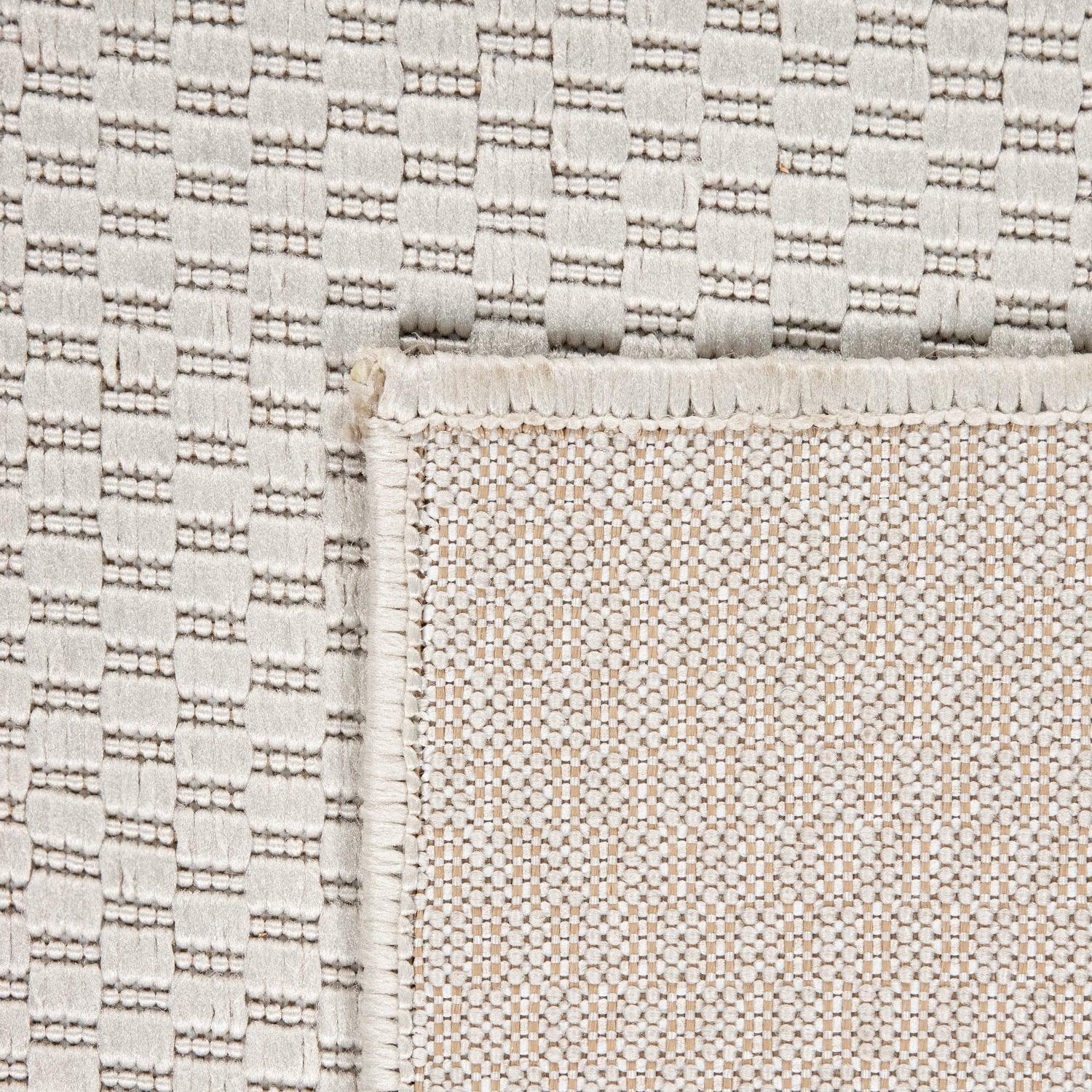 Solid Outdoor Rug for Patio or Balcony Weatherproof in Mottled Cream, side view - House Of Avana