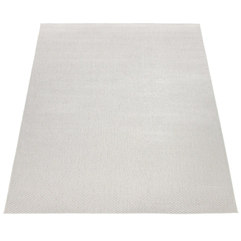 Solid Outdoor Rug for Patio or Balcony Weatherproof in Mottled Cream, lifestyle image - House Of Avana
