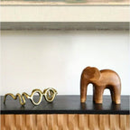 Brown teak elephant sculpture, hand-carved wooden figurine - House of Avana