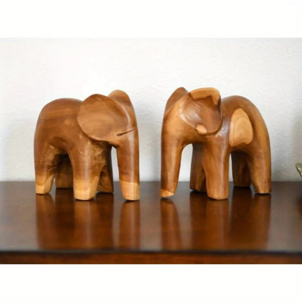 Brown teak elephant sculpture, hand-carved wooden figurine - House of Avana