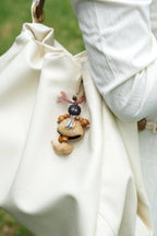 "Forest Nut Doll" Seed Charm