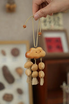 "Happy Cloud" Carved Wood Seed Mobile