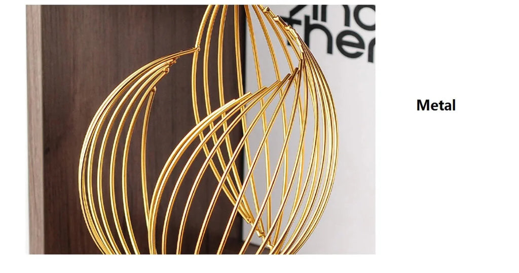 Metal sculpture with twisted geometric base, silver tone, unique boat design - House of Avana