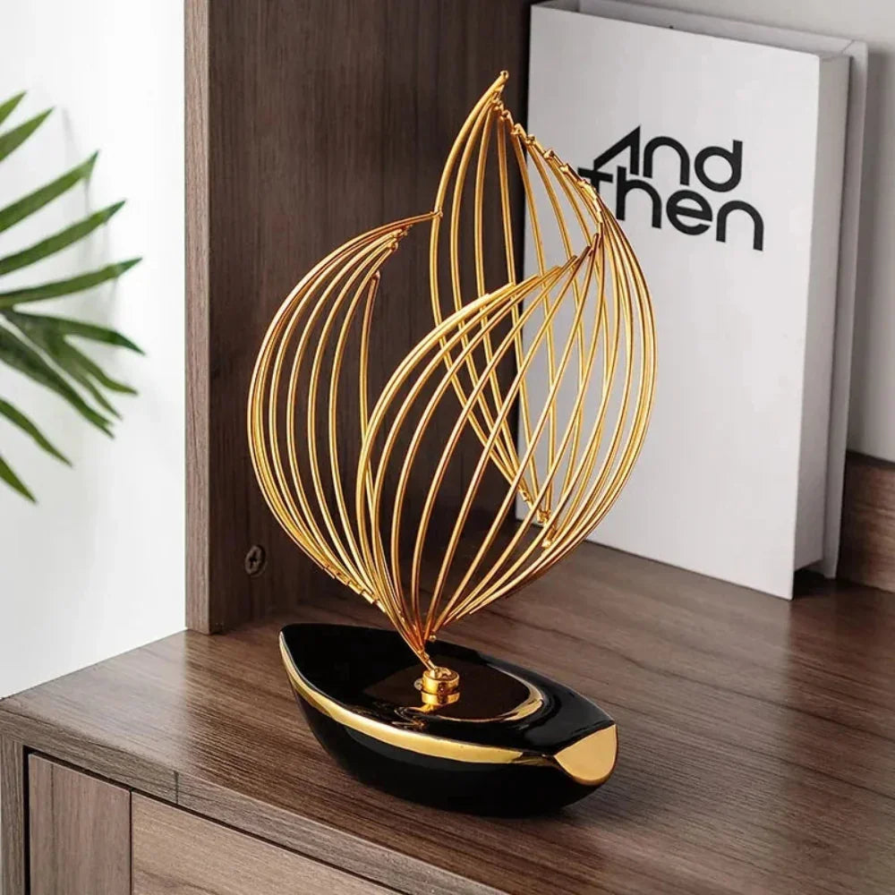 Metal sculpture with twisted geometric base, silver tone, unique boat design - House of Avana