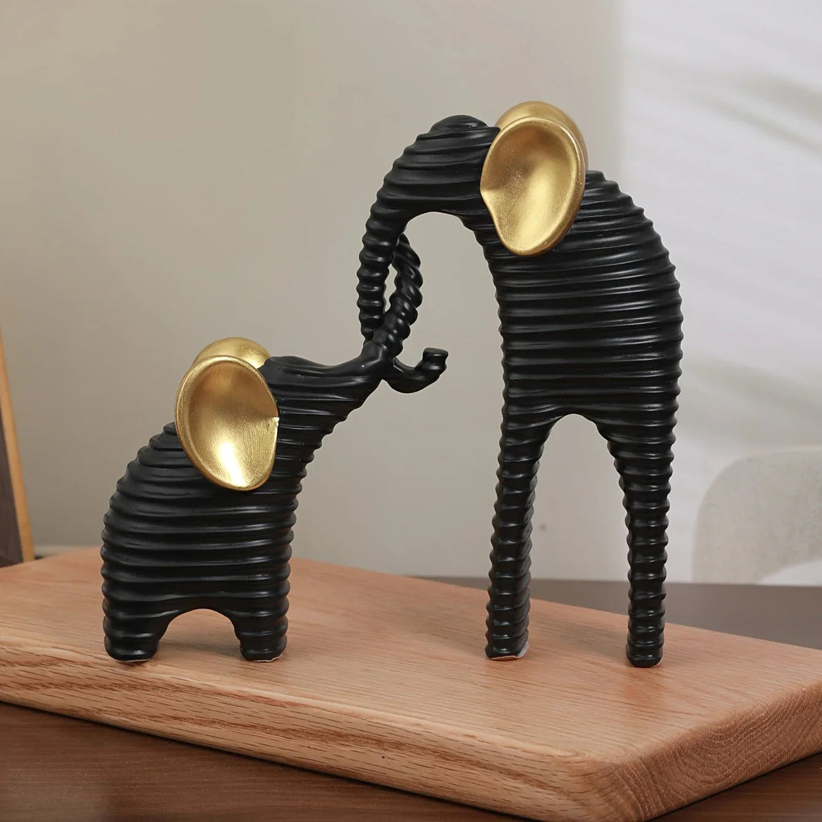 Two High-End Black And Golden/White And Golden Parent- Elephant Figurines for Home Decor, Suitable for Living Rooms, Entryways, Wine Cabinets, And TV Stands. House Of Avana [[SKU:HOA-KDS-401]]