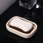 Wabi - sabi style sand - stone resin soap dish. The off - white sand - stone textured dish body is paired with a partition polished from imported North American walnut, presenting a simple and natural look. Sized approximatel House Of Avana [[SKU:HOA-BAT-407]]