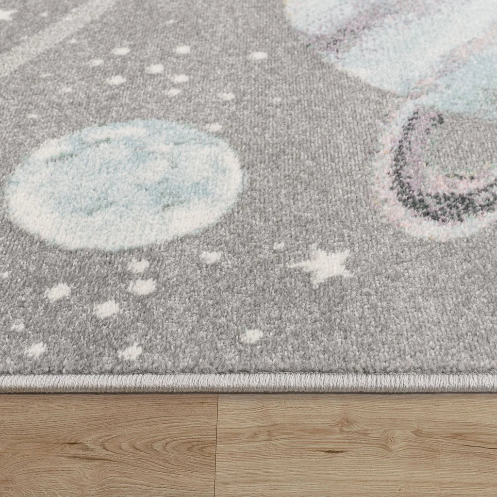 Kids Rug Nino Space with pastel colored Planets and Stars in Grey RugYourHome