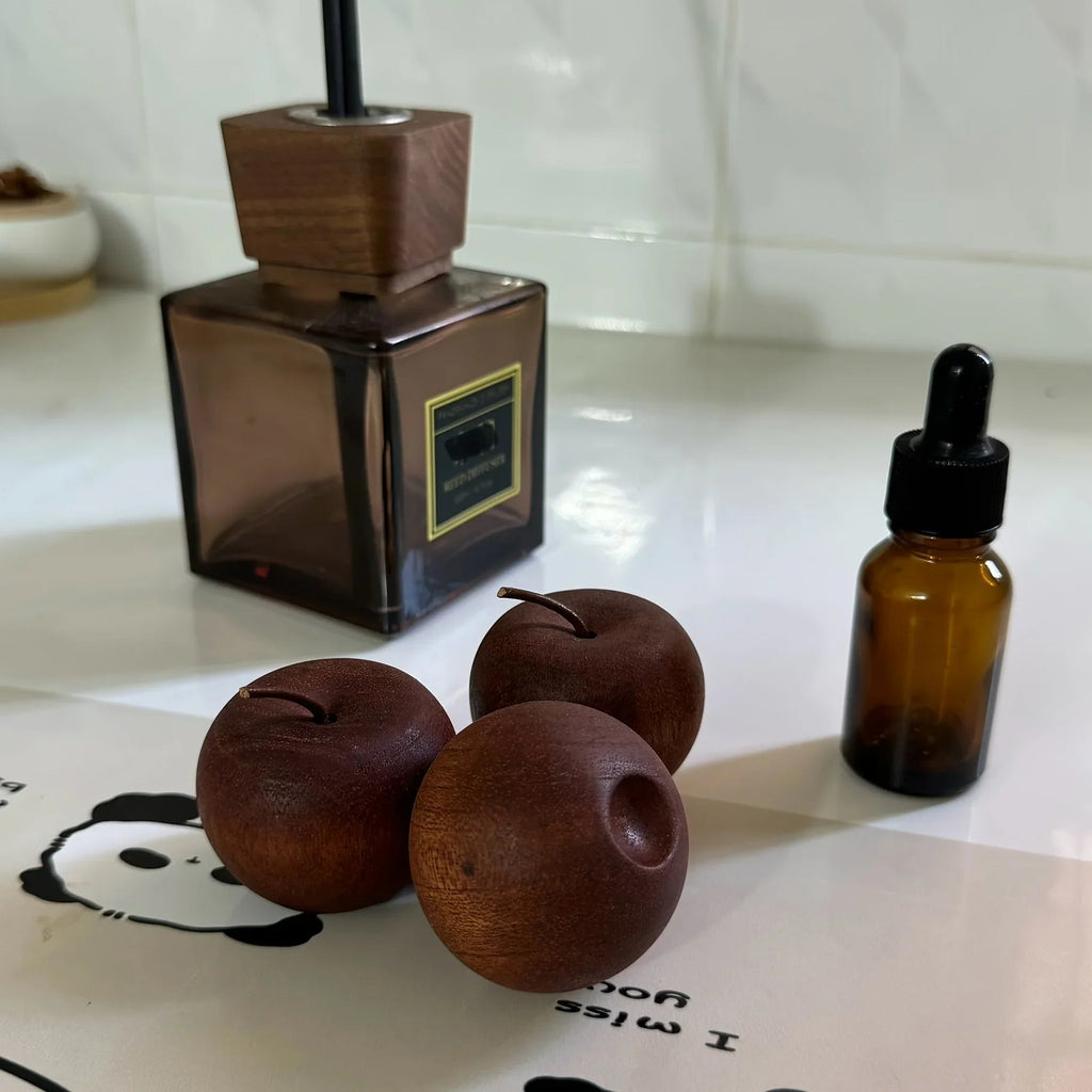 A Randomly Styled Natural Wood Aroma Diffuser with Elegant Wood Grain, Non-Flammable, Perfect Gift Choice - Enhances Air Quality, Apple-Shaped Fragrance Diffuser with Natural Wood Texture, Suitable for Home, Car, Office, Bath House Of Avana [[SKU:HOA-FRG-003]]