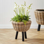 Woven Rattan Planter with Plastic Pot and Wood Legs Vintage Shopper