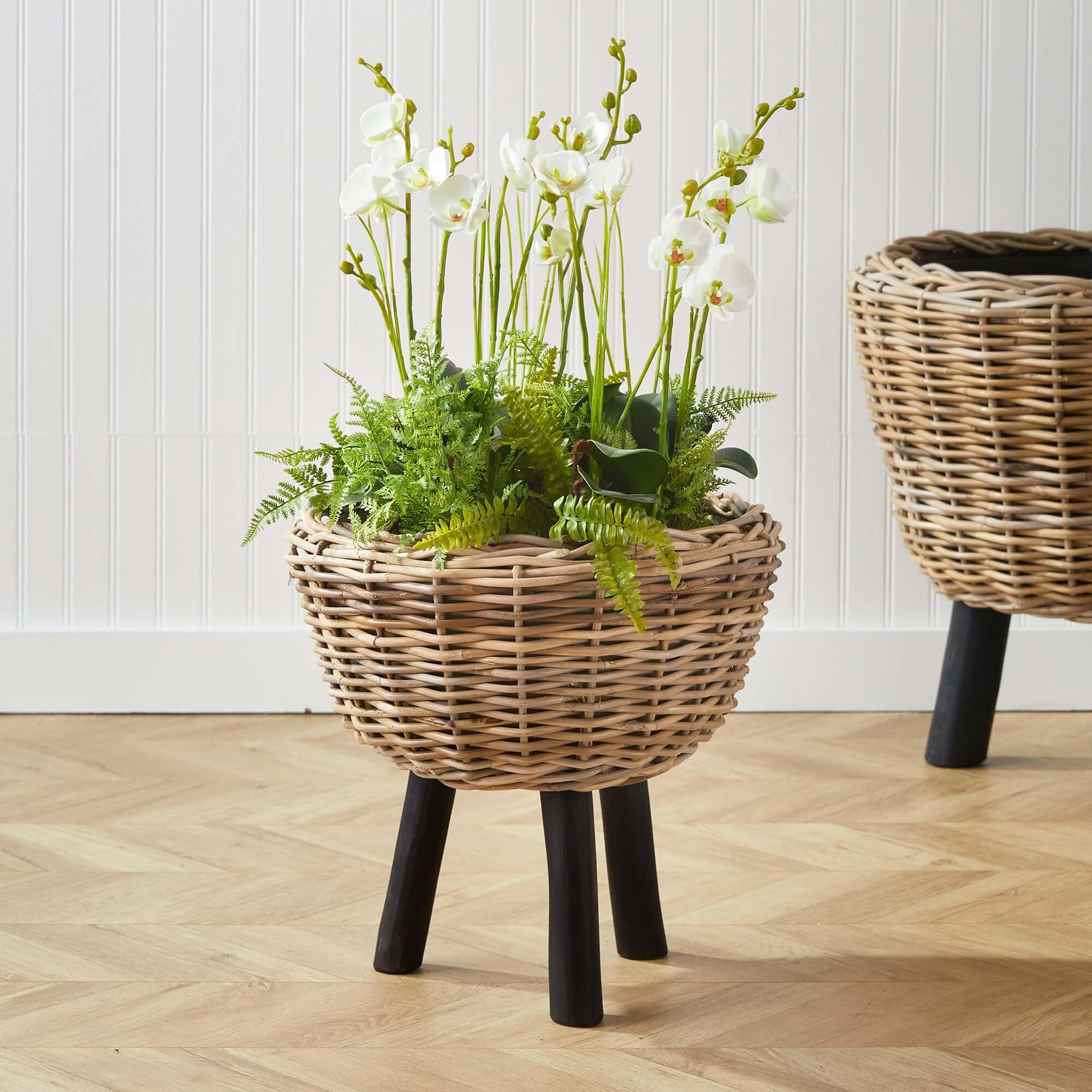 Woven Rattan Planter with Plastic Pot and Wood Legs Vintage Shopper