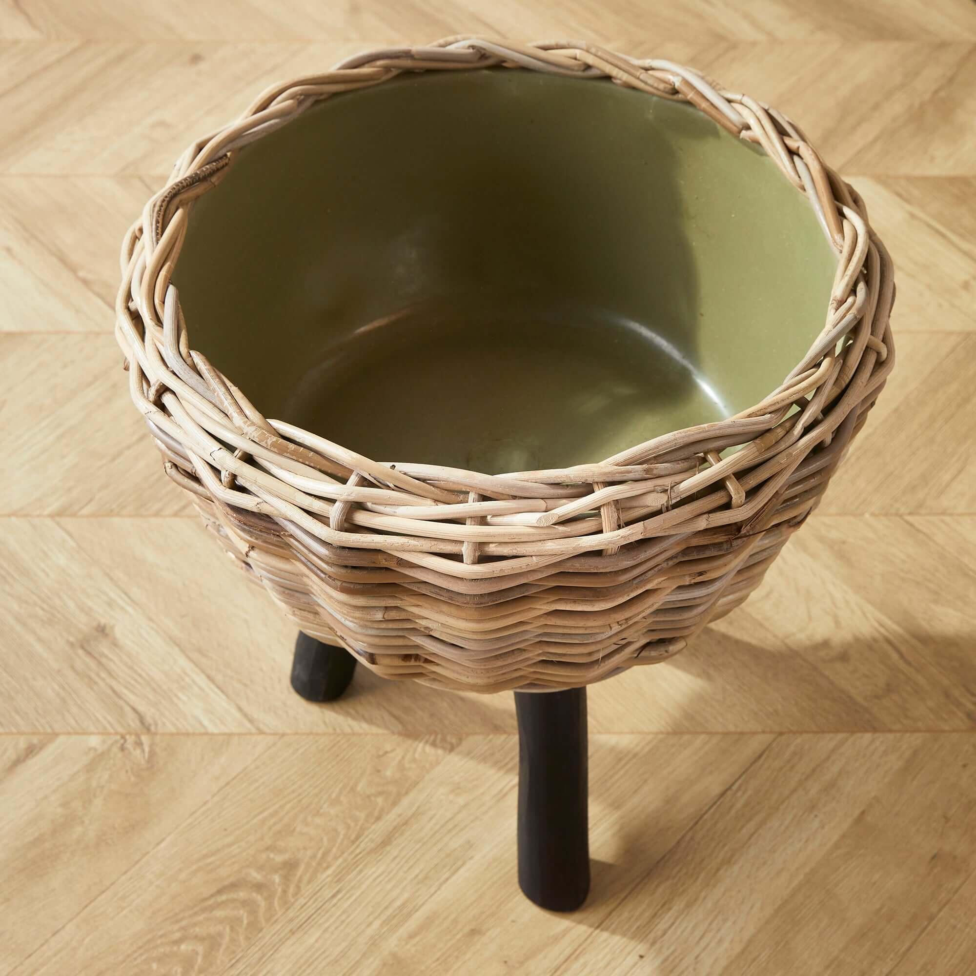 Woven Rattan Planter with Plastic Pot and Wood Legs Vintage Shopper