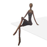 Bronze Statue of Cross-Legged African Woman in Black | House Of Avana
