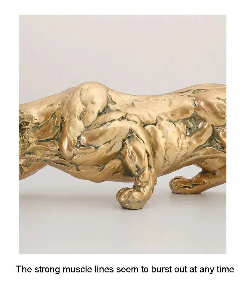 Abstract gold panther sculpture featuring a gold metallic muscular panther figurine with detailed textured surface