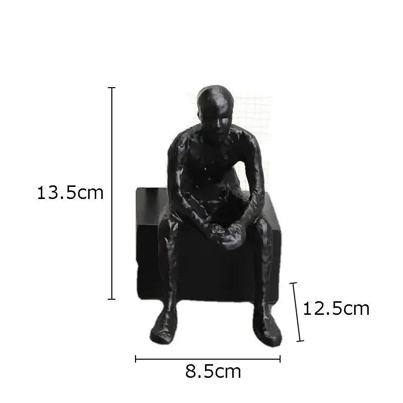 Matte black modern thinker sculpture figurine with long legs, 13.5cm tall and 8.5cm wide at base