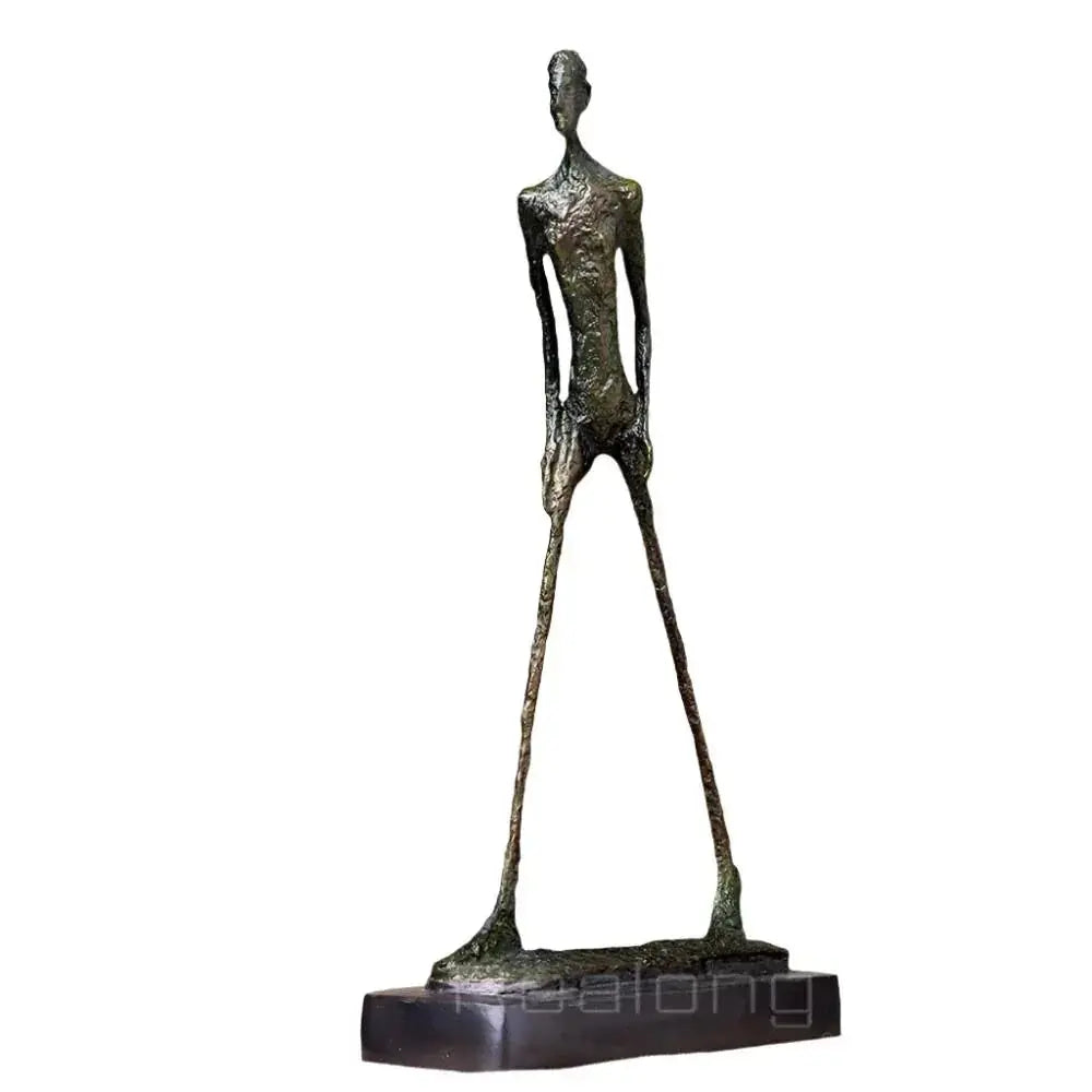 Abstract walking man sculpture in bronze with slender elongated figure and textured surface on a dark base