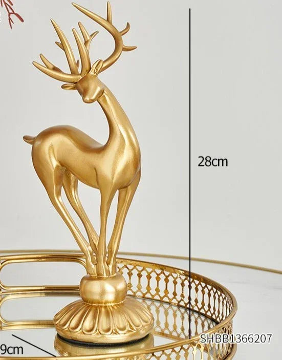 Golden deer figurine with intricate antlers and polished finish featuring crystal floral accents for decoration