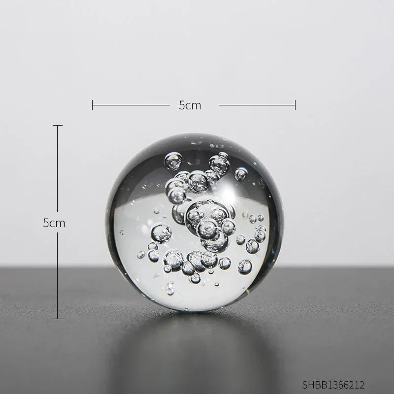 Clear glass orb with silver-toned bubbles measuring 5cm in diameter featuring crystal floral accents in golden deer figurine set