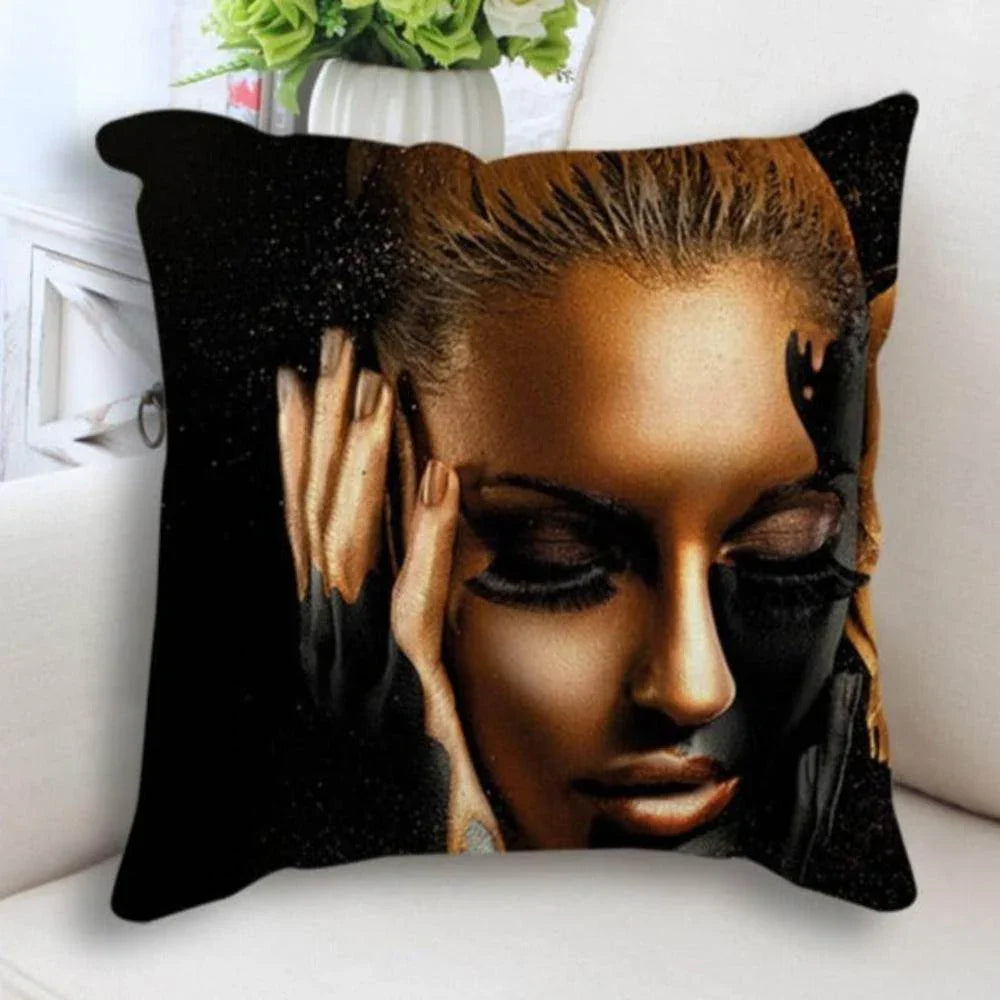Black and gold cushion cover featuring a woman's face, abstract print design - House of Avana