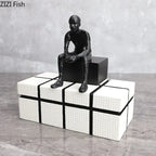 Bronze modern thinker statue, long-legged figurine, metallic finish - House of Avana