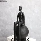 Bronze modern thinker statue, long-legged figurine, metallic finish - House of Avana